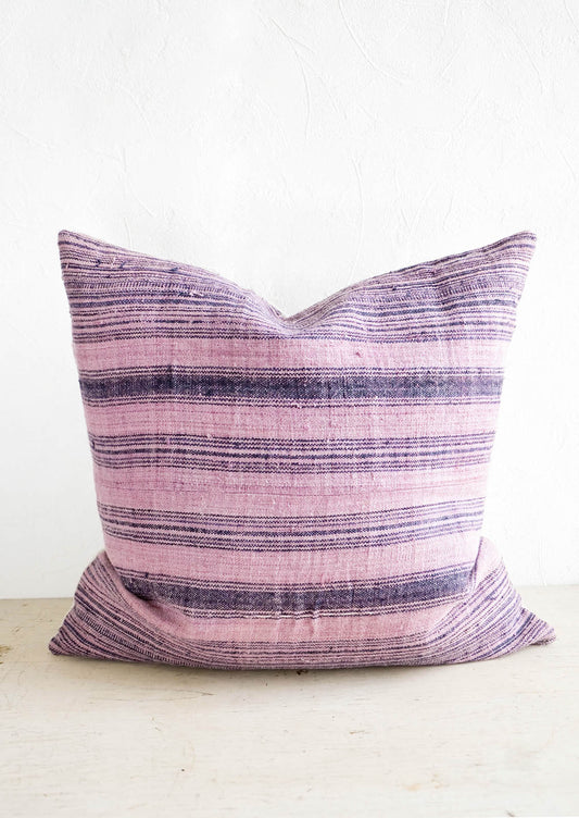 Square throw pillow in lavender colored vintage hemp with indigo stripes