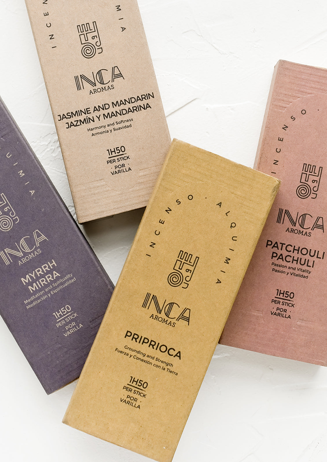 Colored cardboard boxes of stick incense in assorted scents.