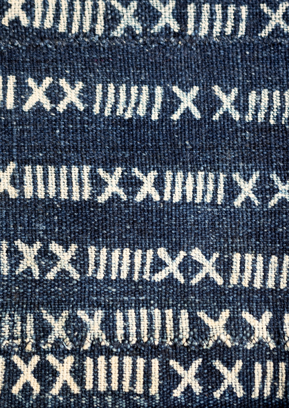 Vintage indigo fabric with numerals pattern.