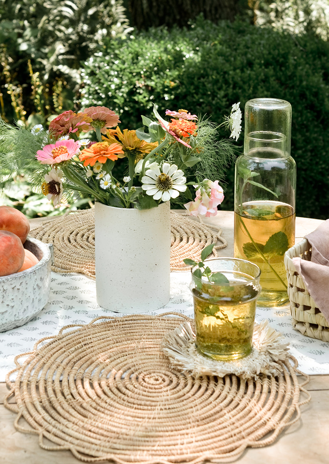 A table setting with woven placemats.