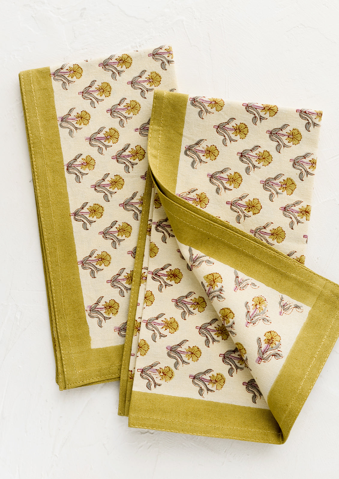 A pair of block printed floral napkins.