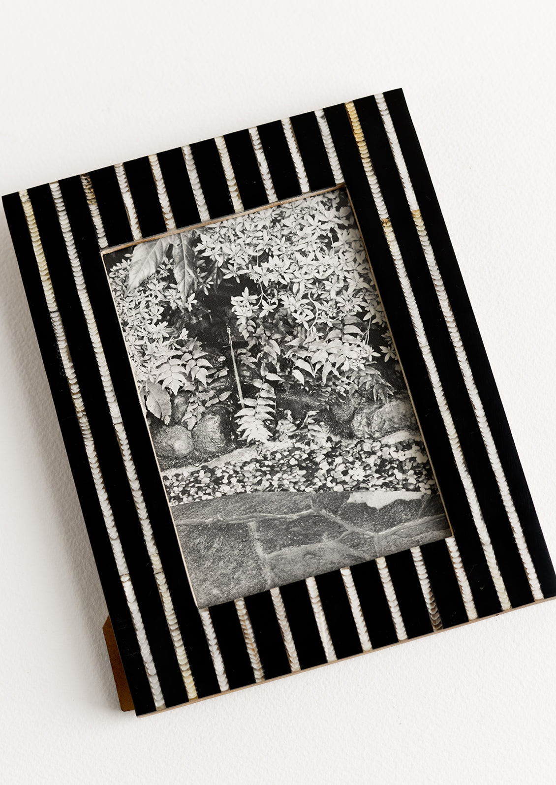 A black and white striped picture frame.A black and white striped picture frame.