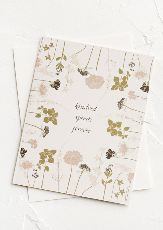 A floral printed card reading Kindred Spirits Forever.