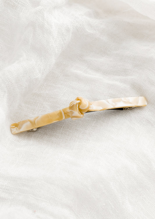 Acetate barrette with knot detail in cream