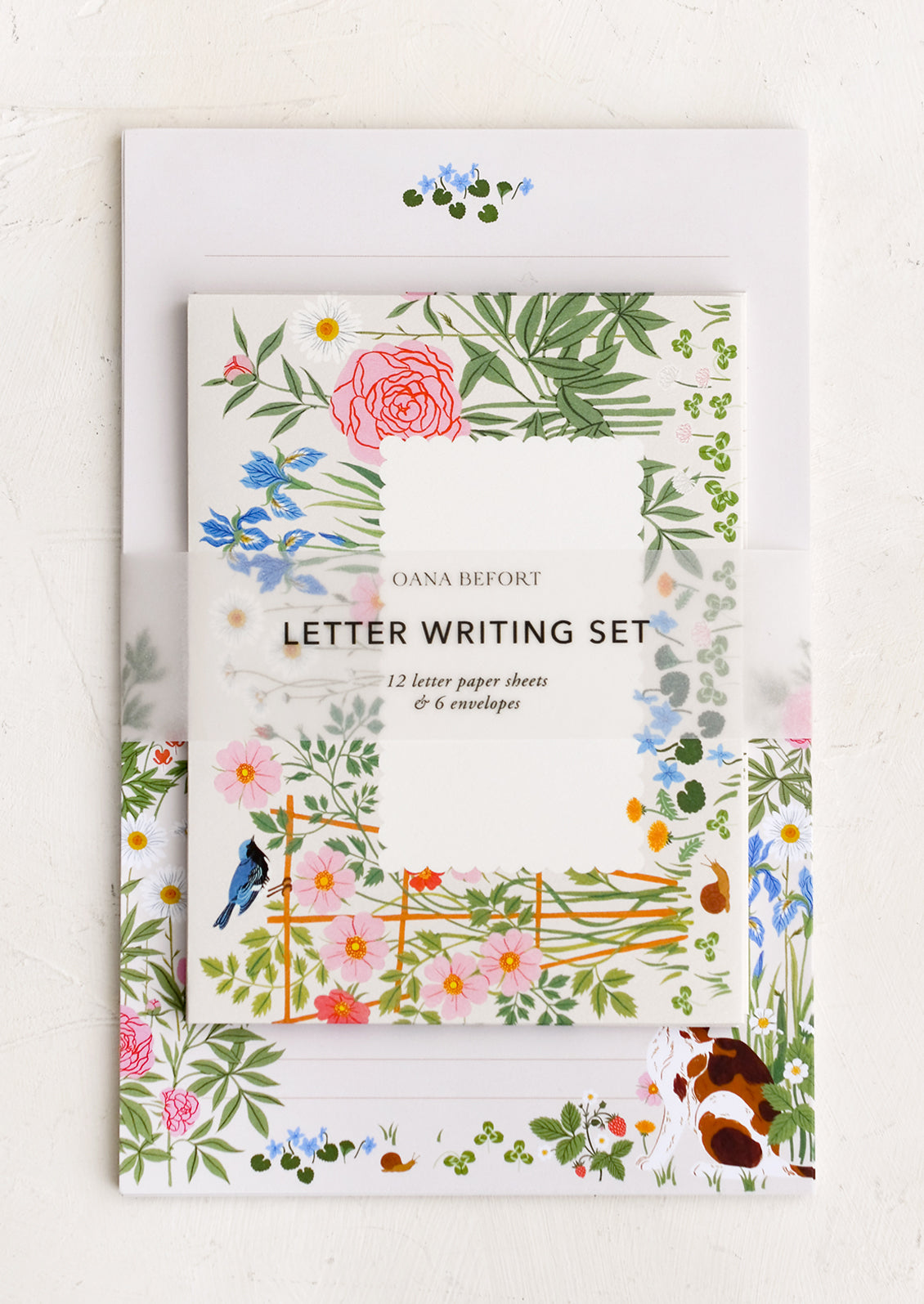 A set of white and colorful garden print letter writing kit.