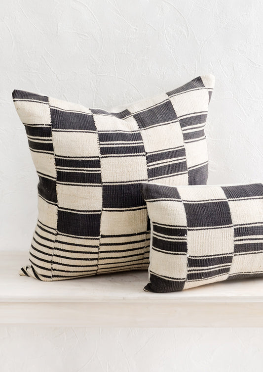 Throw pillows made from vintage African black and white fabric.