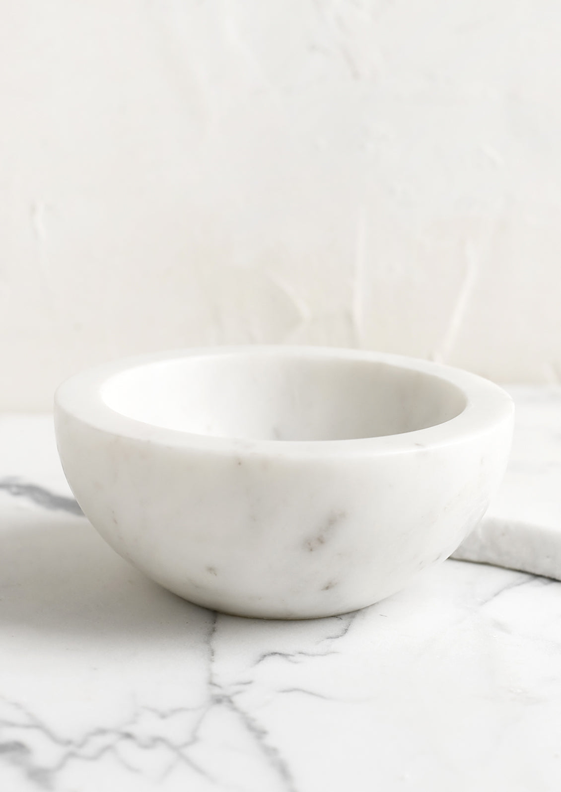 A small white marble bowl.