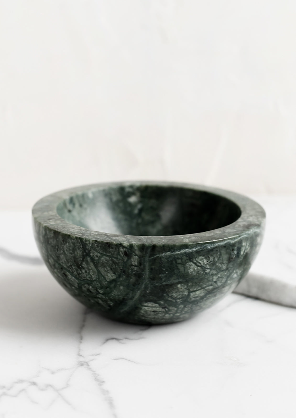 A small green marble bowl.