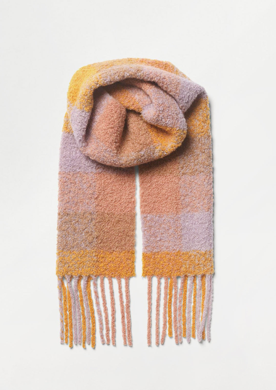 A teddy textured scarf in pastel check print.