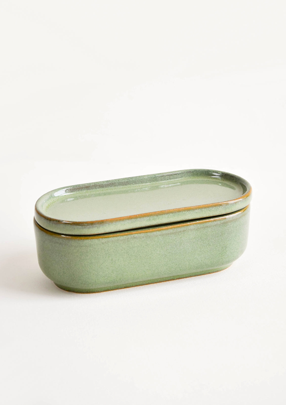 Oblong oval green Ceramic Container with Lid.