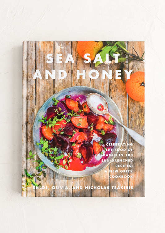 A hardcover cookbook with image of beet salad on cover.