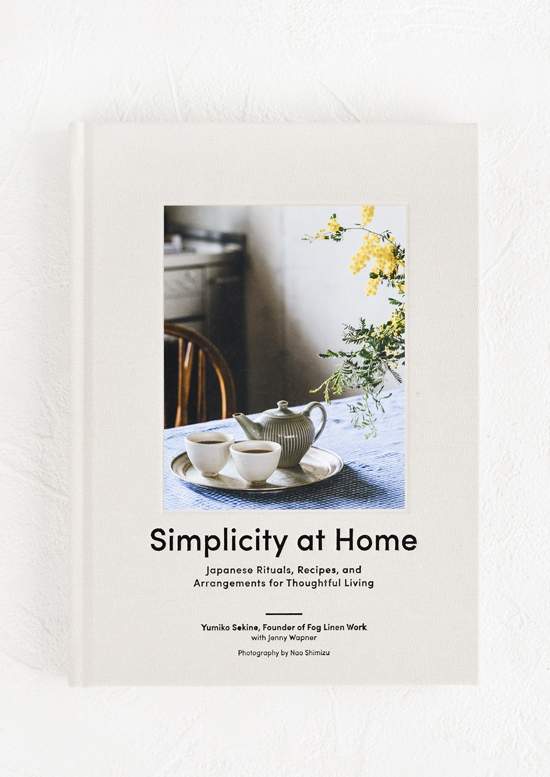 A coffee table book with interior lifestyle image on cover.