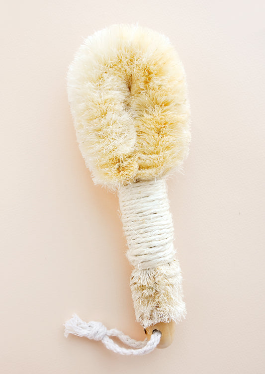 Wooden brush with twine wrapped handle and exfoliating head