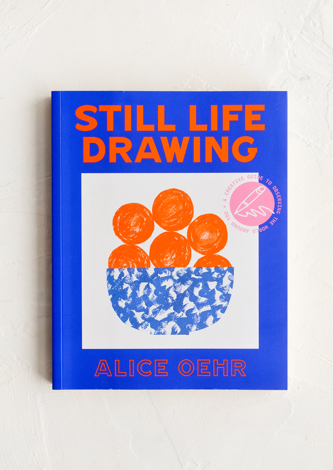 Blue and orange book about Still Life Drawing.