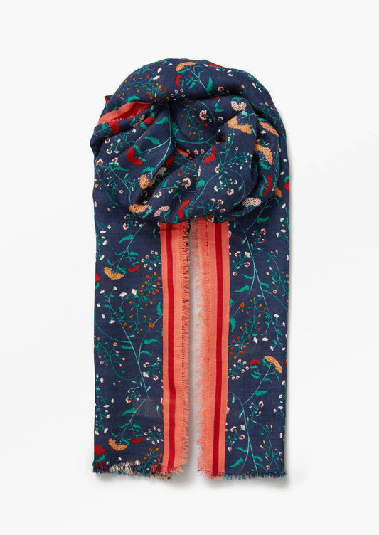 A navy blue and red scarf in wildflower print.