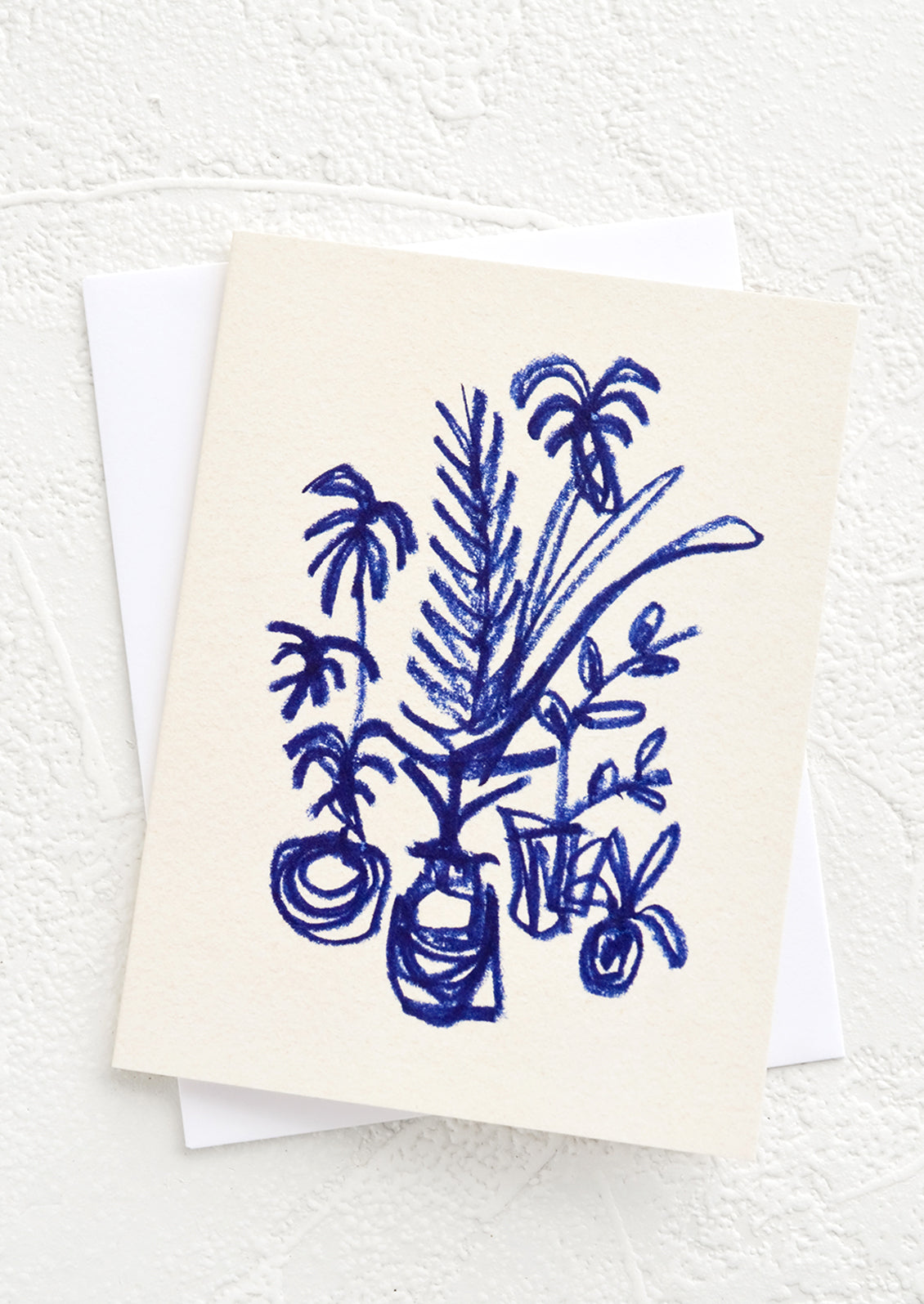 A small greeting card with ecru background and image of potted plants with "hand drawn" effect.