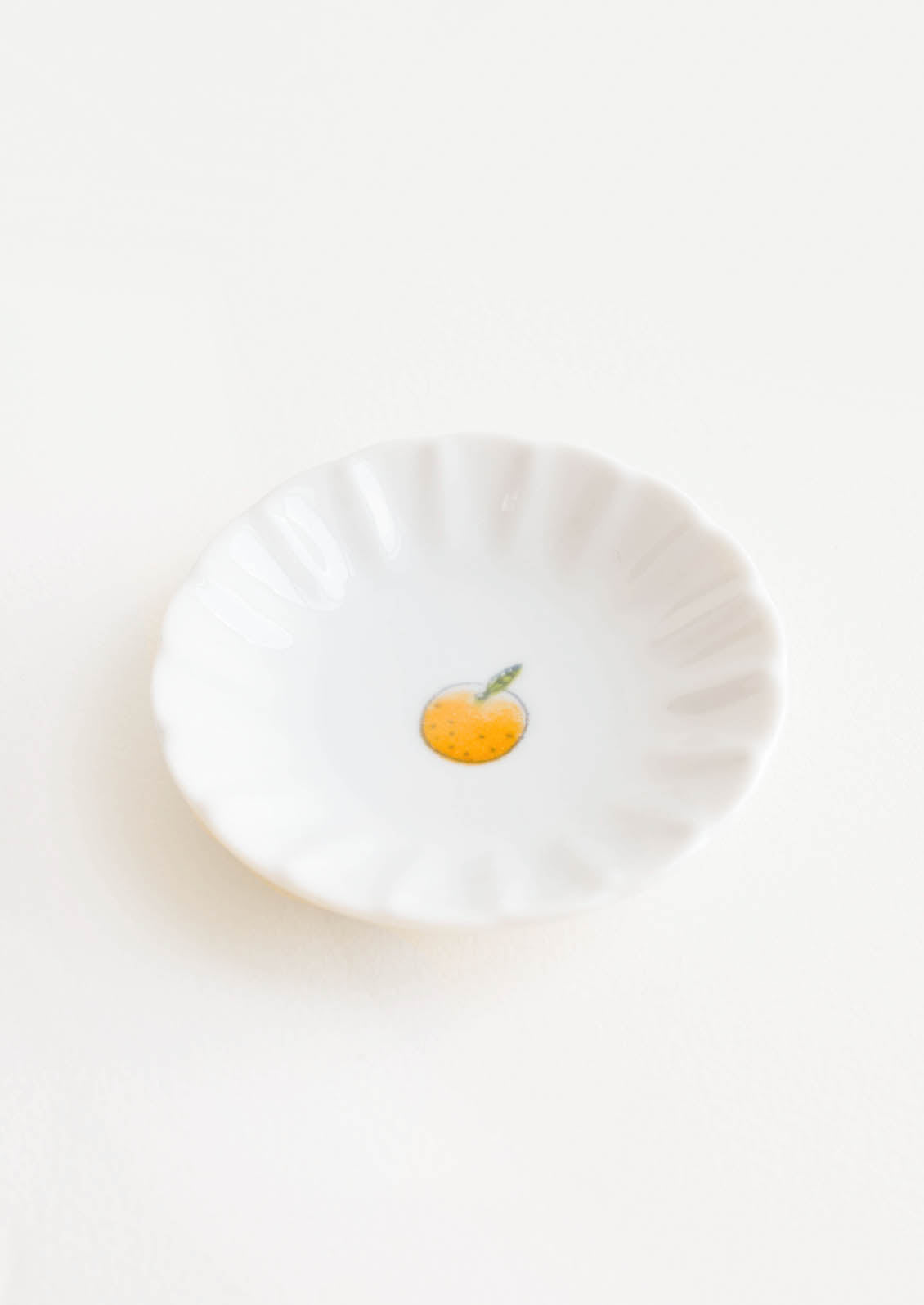 Scalloped Ceramic Mini Dish with Little Orange Fruit - LEIF