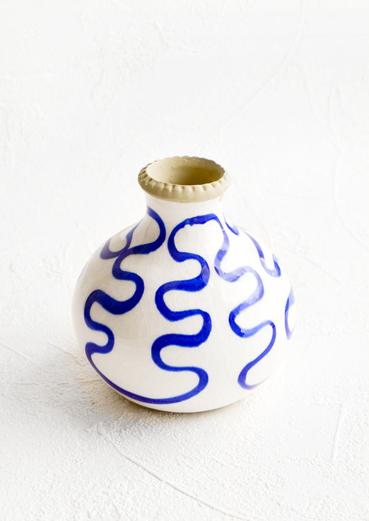 Short bud vase in glossy white ceramic with cobalt blue squiggle print